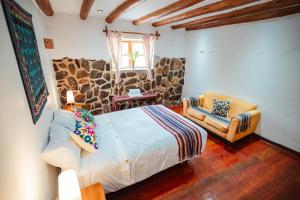 Voodi või voodid majutusasutuse Picaflor Tambo Guest House toas