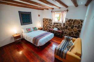 Voodi või voodid majutusasutuse Picaflor Tambo Guest House toas