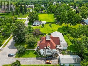 an aerial view of a house with a yard at Marmora and Lake Inn and Victorian Diner in Marmora