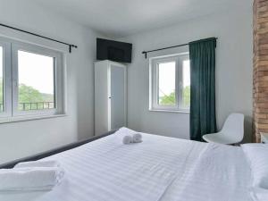 Postel nebo postele na pokoji v ubytování Villa Didovi Snovi Li ane + 63 fotografií