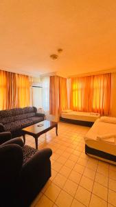 Voodi või voodid majutusasutuse Damlatas Elegant Apart Hotel toas