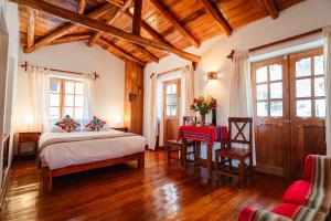 Postel nebo postele na pokoji v ubytování Picaflor Tambo Guest House