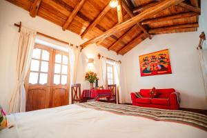 Postel nebo postele na pokoji v ubytování Picaflor Tambo Guest House