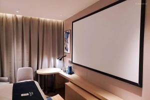 TV a/nebo společenská místnost v ubytování Echarm Hotel Chengdu KuanNarrow Alley JinXianQiao Branch 宜尚酒店成都宽窄巷子金仙桥店