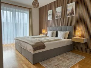 Postel nebo postele na pokoji v ubytování DreamStay