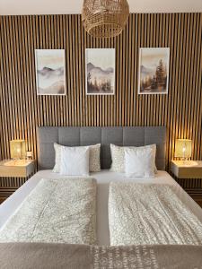 Postel nebo postele na pokoji v ubytování DreamStay
