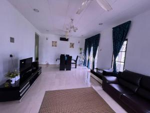 Et opholdsområde på Homestay D Zamrud Izhansif