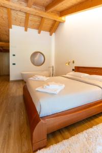 Postel nebo postele na pokoji v ubytování Agriturismo Donec