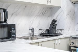 Bilde i galleriet til Elegant studio for 4 in JVC i Dubai