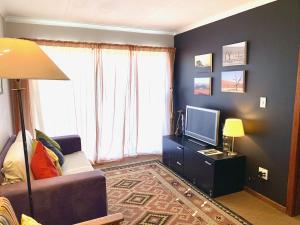 Coin salon dans l'établissement Ikhaya le Inkhuku A cozy retreat in Sunrise-on-Sea