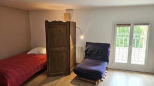Posteľ alebo postele v izbe v ubytovaní Maison vigneronne 8p / jardin / parking