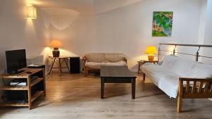 Posteľ alebo postele v izbe v ubytovaní Maison vigneronne 8p / jardin / parking