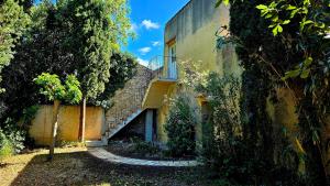 Vonkajšia záhrada v ubytovaní Maison vigneronne 8p / jardin / parking