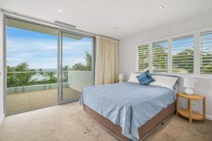 En eller flere senge i et værelse på Avoca Views