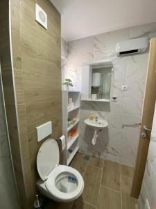 Kúpeľňa v ubytovaní Apartman Emilija