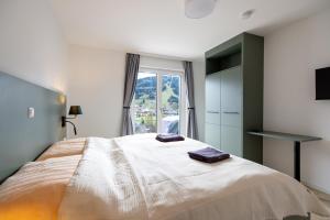 Posteľ alebo postele v izbe v ubytovaní Panorama Appartement