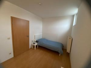 Postel nebo postele na pokoji v ubytování Monteurwohnung , 4 Schlafzimmer, 130qm, Balkon, einzige Wohneinheit im Haus, Parkplatz