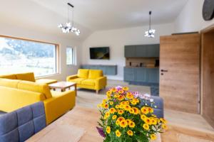 Televízia a/alebo spoločenská miestnosť v ubytovaní Panorama Appartement