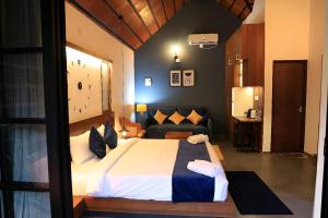 Bay View Suites, Vythiri, Wayanad客房内的一张或多张床位