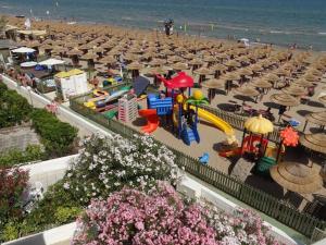 a view of a beach with a toy playground at Case Vacanze Rodi Garganico in Rodi Garganico