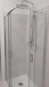 a shower with a glass enclosure in a bathroom at Case Vacanze Rodi Garganico in Rodi Garganico
