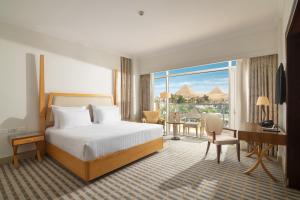 Steigenberger Pyramids Cairo客房内的一张或多张床位