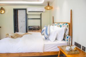 Postel nebo postele na pokoji v ubytování Villasiita, Jaipur