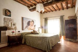 Postel nebo postele na pokoji v ubytování Agriturismo Il Caggio