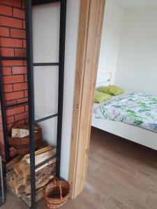 Postel nebo postele na pokoji v ubytování Chalupa Výtoň