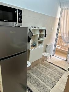 Kuchyň nebo kuchyňský kout v ubytování Arkadia`Kalithea