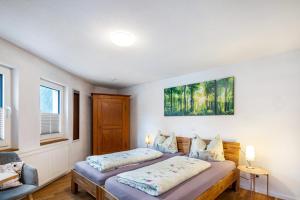 a bedroom with two beds in a room at Sand 68 in Steinau an der Straße