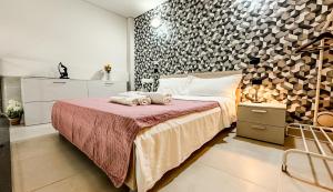 Postel nebo postele na pokoji v ubytování Modern Loft Torino - Parcheggio, Palestra, Comfort