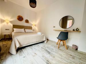 Postel nebo postele na pokoji v ubytování Ionion Apartment