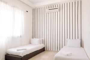 Ένα ή περισσότερα κρεβάτια σε δωμάτιο στο Large Stylish Condo Central Gueliz with Pool Access