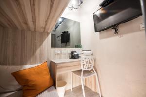 TV o dispositivi per l'intrattenimento presso Art Inn - Kaifeng