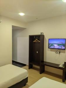 Letto o letti in una camera di The View Hotel