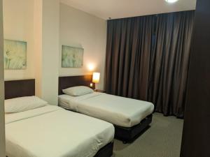 Letto o letti in una camera di The View Hotel