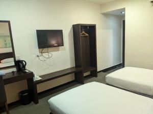 Letto o letti in una camera di The View Hotel