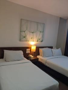Letto o letti in una camera di The View Hotel