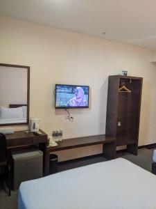 TV o dispositivi per l'intrattenimento presso The View Hotel