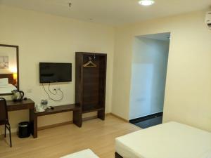 TV o dispositivi per l'intrattenimento presso The View Hotel