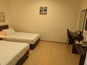 Letto o letti in una camera di The View Hotel