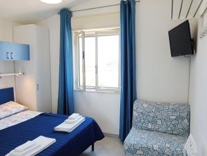 A bed or beds in a room at Villa Cavarra