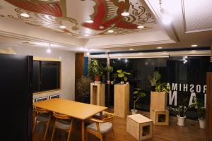 TV a/nebo společenská místnost v ubytování ゲストハウス ブランク Guest House BLANC