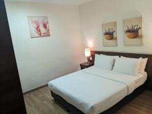 Letto o letti in una camera di The View Hotel