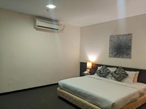 Letto o letti in una camera di The View Hotel