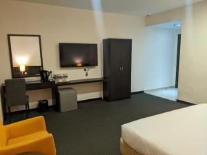 Letto o letti in una camera di The View Hotel