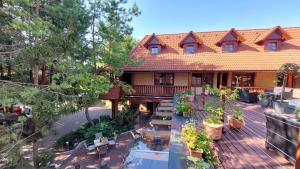 an aerial view of a house with a deck at Hotel Frýdl in Prague