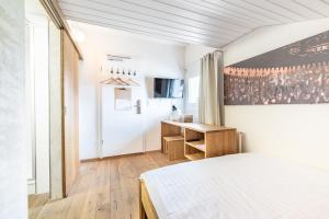Postel nebo postele na pokoji v ubytování Hotel Kaiserstuhl