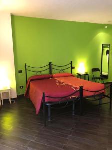 Postel nebo postele na pokoji v ubytování Agriturismo Lucchetti Ferrari